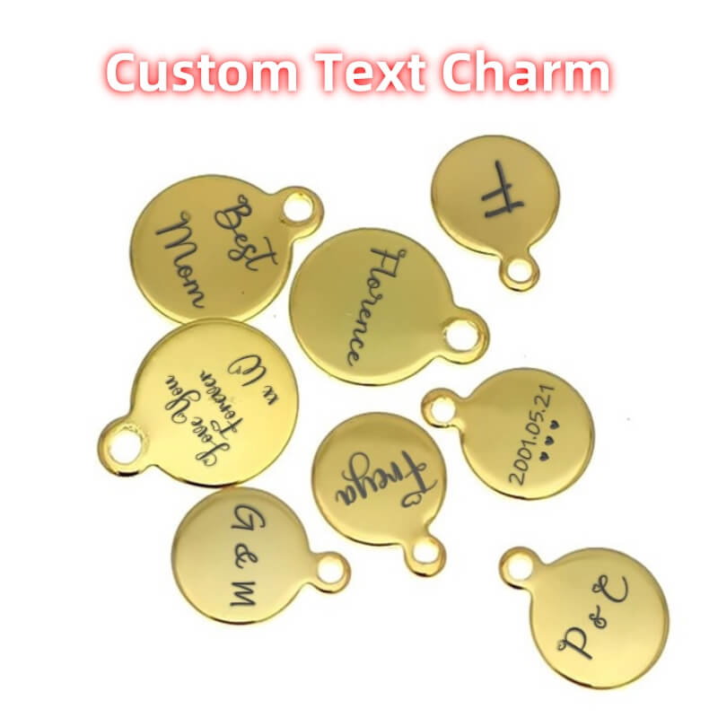 a bunch of gold charms with names on them